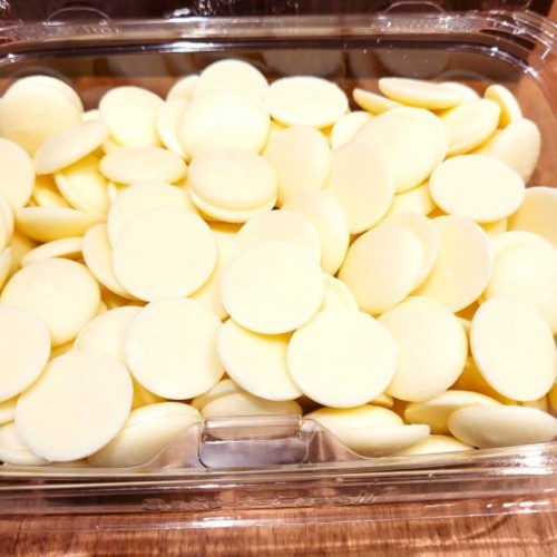 Merckens White Chocolate Melting Wafers - 50 lbs Merckens White Chocolate Melting Wafers - 50 lbs